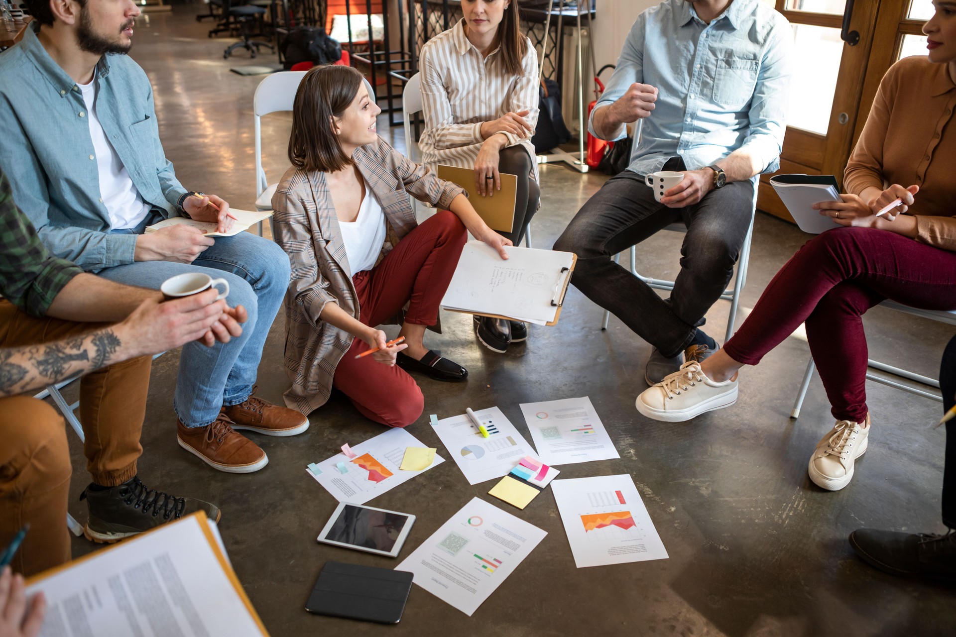 Group of Businesspeople Having a Brainstorming Meeting during a Skill Building Workshop